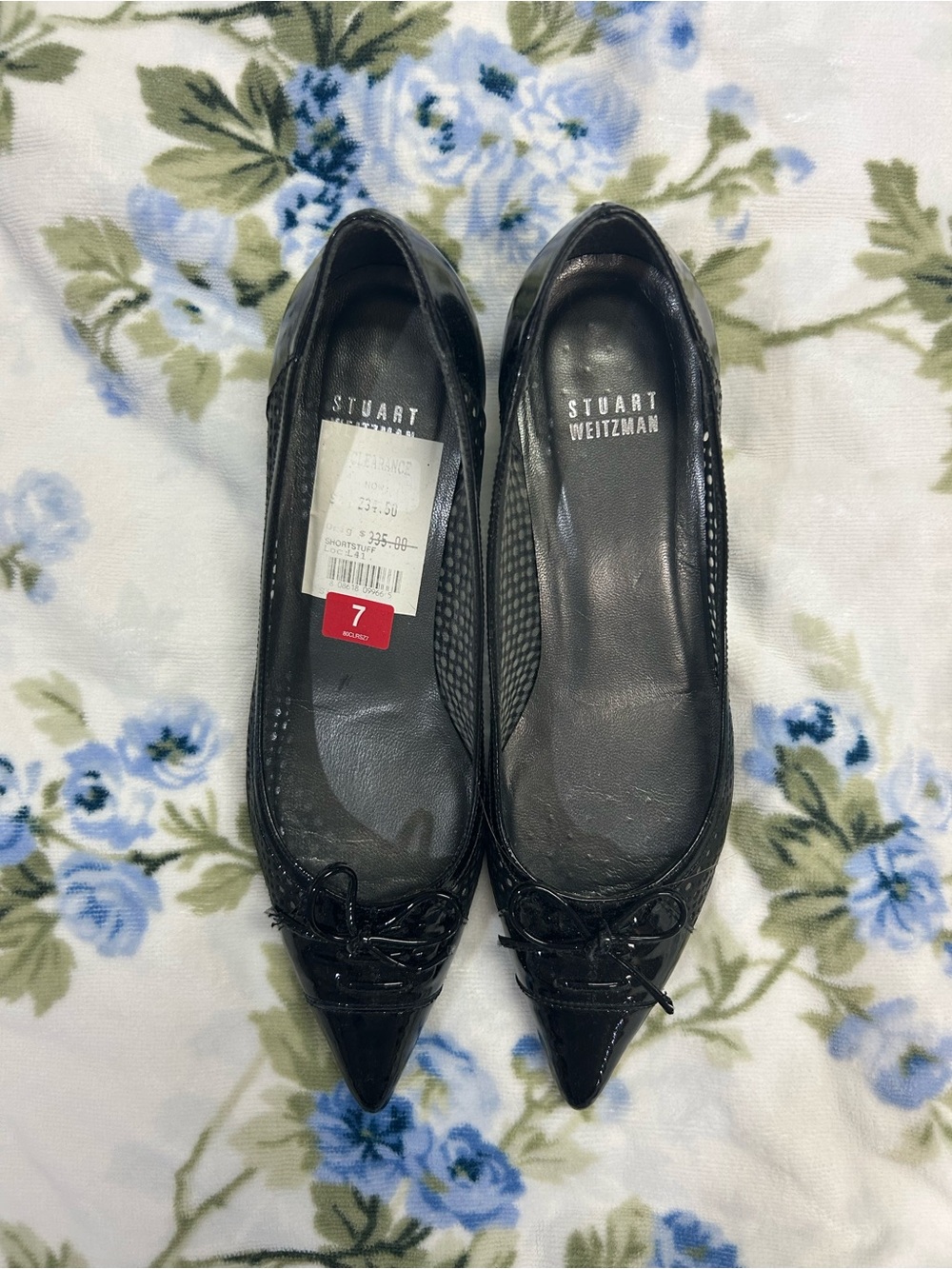 Stuart Weitzman black kitten heels with bow corset detail